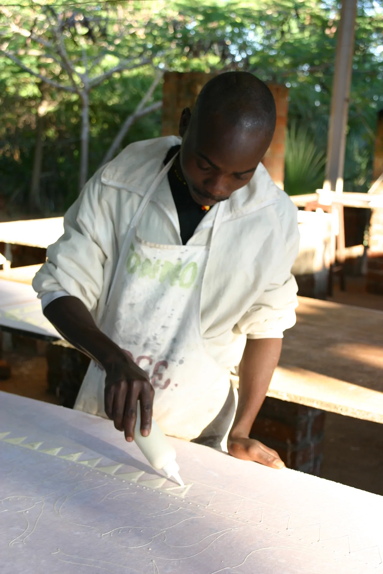 Een sierrand ter afsluiting van de tekening [<i>Tribal Textiles</i>, Mfuwe]