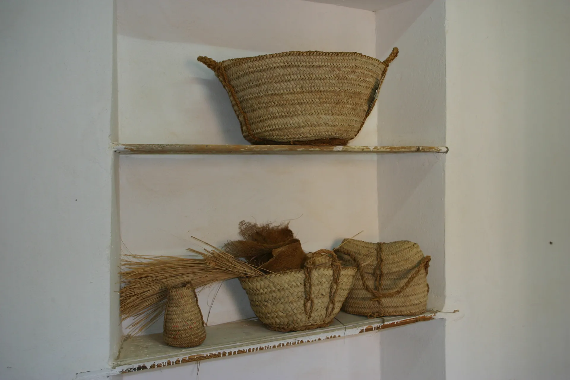 Manden van palmblad [Ghadames, museum]